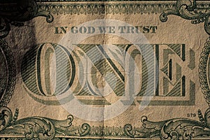 The word `ONE` from the one dollar bill embedded.