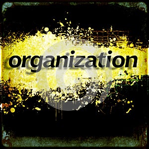 Word `organization` on black and yellow grunge background.