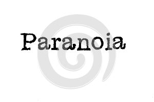 The word `Paranoia` from a typewriter on white