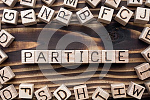 word particle composed of wooden cubes