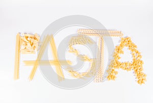 The word `pasta` spelled with raw pasta