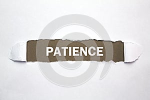 Word Patience on torn paper