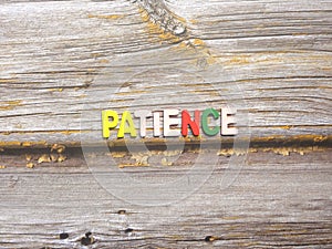 Word Patience on wood