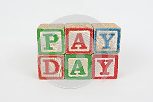 The Word Pay Day in Wooden Childrens Blocks