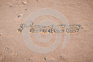The Word `Peace` Written in the Sand