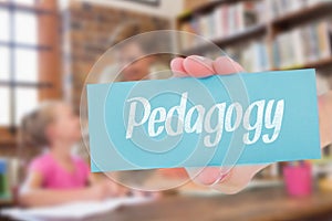 Pedagogy against teacher helping pupils in library photo