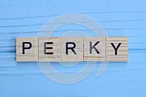 word perky made from wooden gray letters