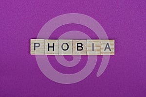 Word phobia from small gray wooden letters