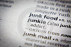 Word or phrase Junkie in a dictionary. photo