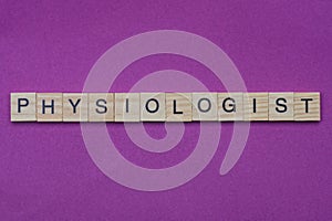 Word physiologist from small gray wooden letters photo