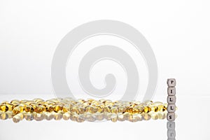 Word pills from the letters of cubes and Lecithin gel pills on l