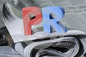 Word PR on newspaper photo