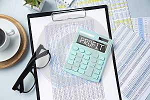 Word PROFIT on calculator. Business and tax concept on white background. photo