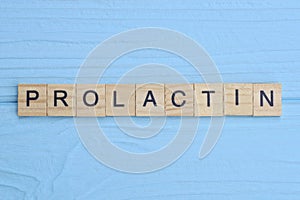 word prolactin made of small gray wooden letters