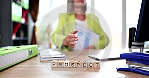 Word prospect is written on background of woman holding out hand for handshake closeup 4k movie slow motion