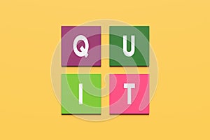 The word quit on colorful square blocks on yellow background. To quit smoking, quitting a job resignation or quitting something