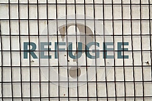 Word Refugee and fence photo