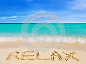 Una palabra relajarse sobre el Playa 
