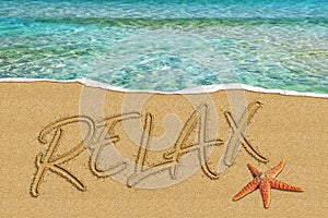 Word Relax written On the Beach