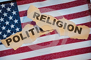 The word religion laying over the word politics on an American F