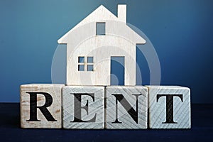 Word Rent from cubes and model of home. Real estate