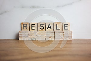 Word resale from wooden blocks. Second hand shopping, thrift concepts