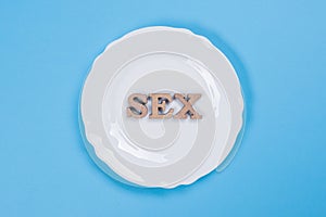 The word sex in abstract wooden letters.