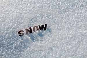 The word snow from wooden letters