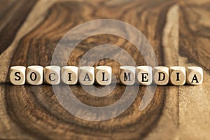 Word SOCIAL MEDIA on wooden cubes