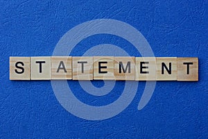 Word statement made from brown wooden letters