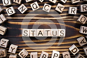 Word status composed of wooden cubes