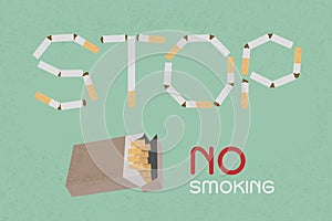 Word Stop made of cigaret stubs photo