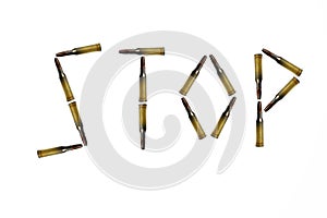 The word STOP made of rifle bullets