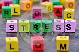 The word Stress on table