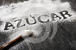 Word sugar in Spanish written with sugar photo