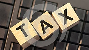 Word tax made with wood building blocks, stock image
