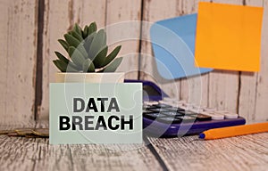 Word text DATA BREACH on white paper card, business concept.