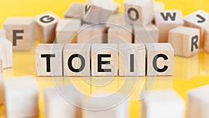 word toeic written on wood blocks, concept