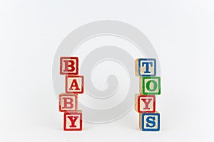 The Word Toy and Baby in Wooden Childrens Blocks