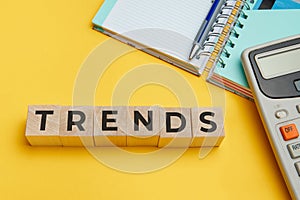 The word TRENDS on wooden cube block