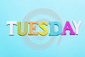 Word tuesday in multicolored letters on