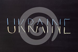Word `Ukraine` writed on blackboard