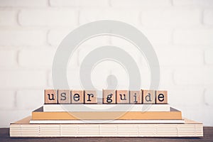 The word User guide and copy space background.
