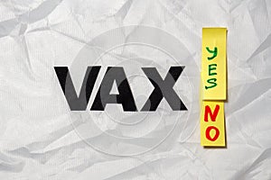 Word VAX and stickers Yes, No on white crumpled background, top view. Concept of choosing for or against vaccination