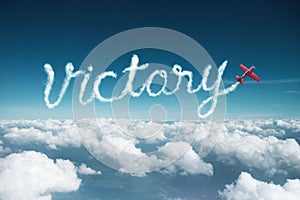 Word victory made by airplane