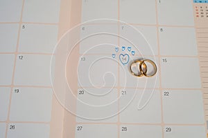 Word Wedding to Reminder Wedding day with Wedding ring on calendar planning and office tool