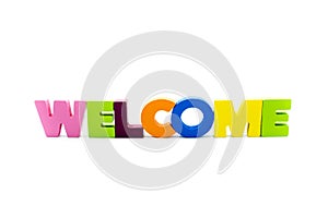 Word WELCOME written with colourful wooden letters, over white with copy space