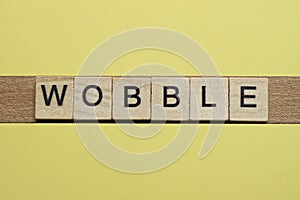 Word wobble made from wooden letters