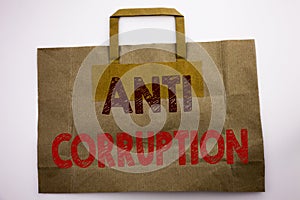 Word, writing Anti Corruption. Business concept for Bribery Corrupt Text Written on shopping bag, white isolated background.