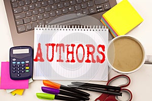 Word writing Authors in the office with laptop, marker, pen, stationery, coffee. Business concept for Word Message Text Typograph photo